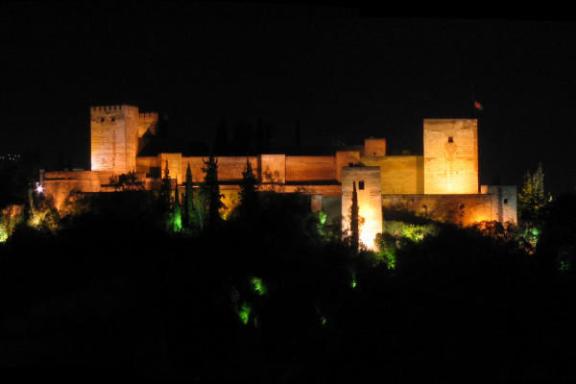 a clock tower lit up at night