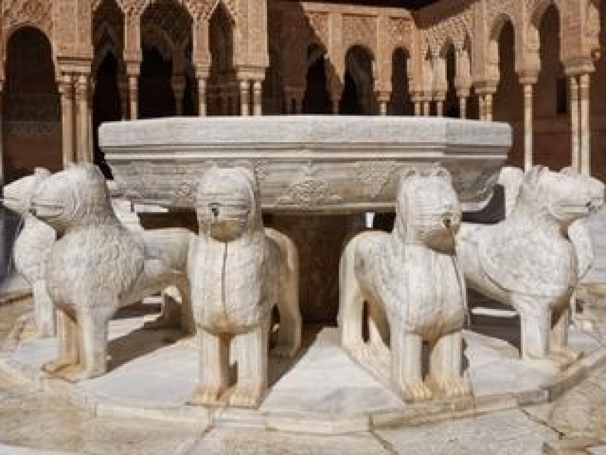 a group of men standing in front of a building